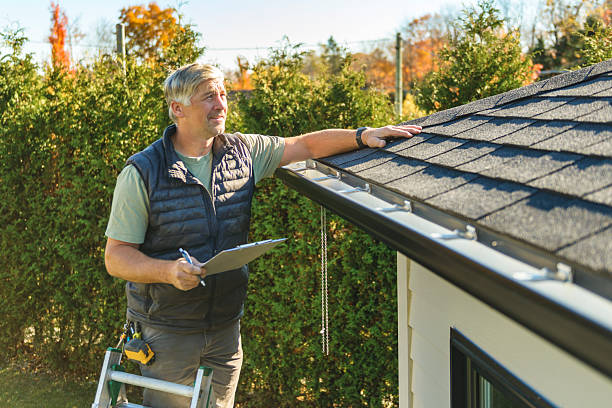 Professional Roofing technician working in Selden, NY